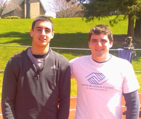 Brian Doherty '06 (r.), former Prep 400m record holder (49.1), on hand to congratulate the Prep's new quarter mile king 